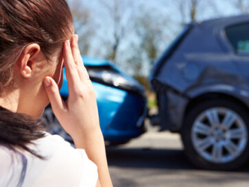 woman-worried-after-car-accident