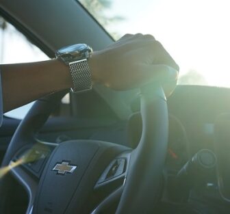 Car Insurance Types-Man-wristwatch-Chevy-Steering-wheel